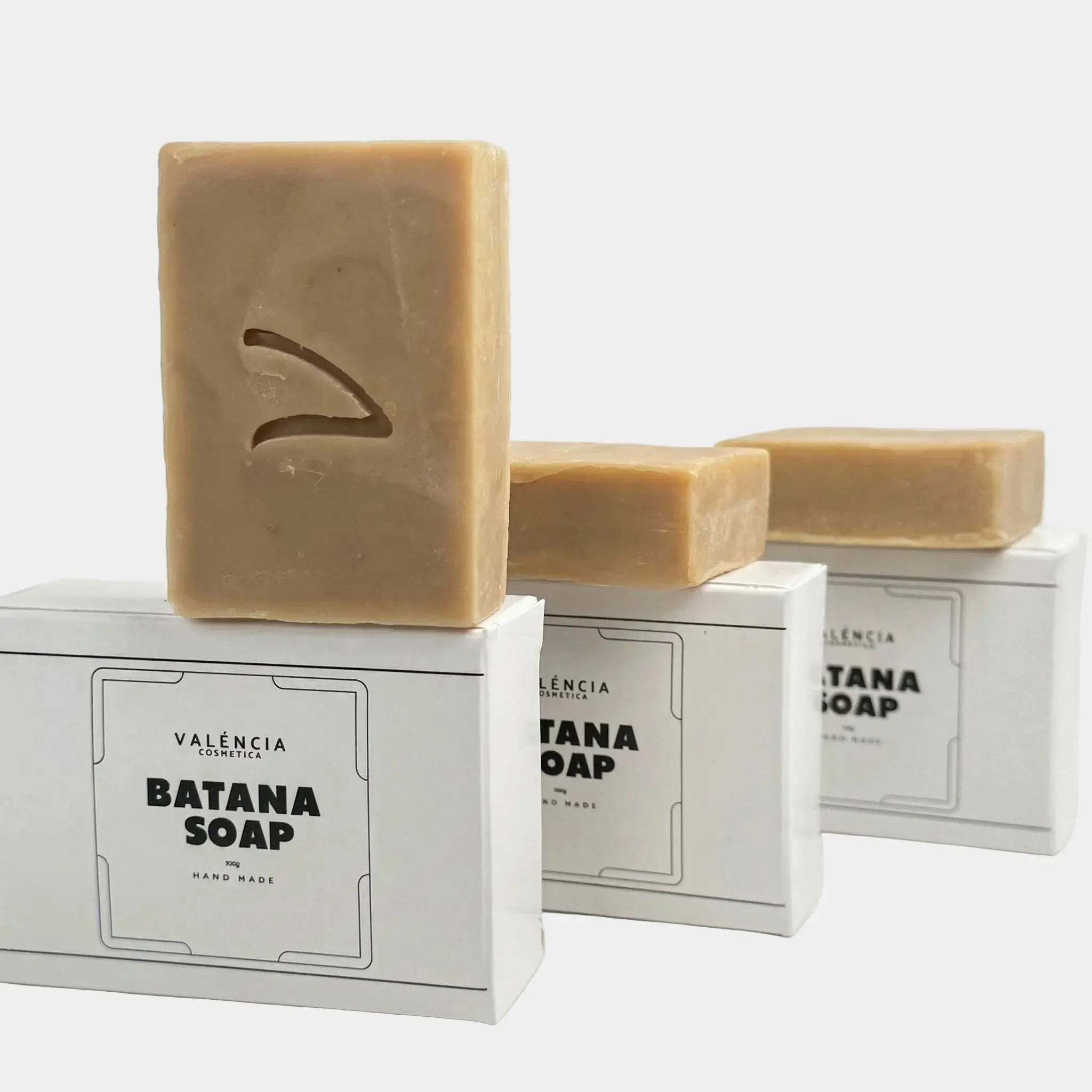 VALÉNCIA Batana shampoo and body bar soap, tan rectangular bar with leaf emblem